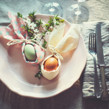 easter eggs and flowers on table